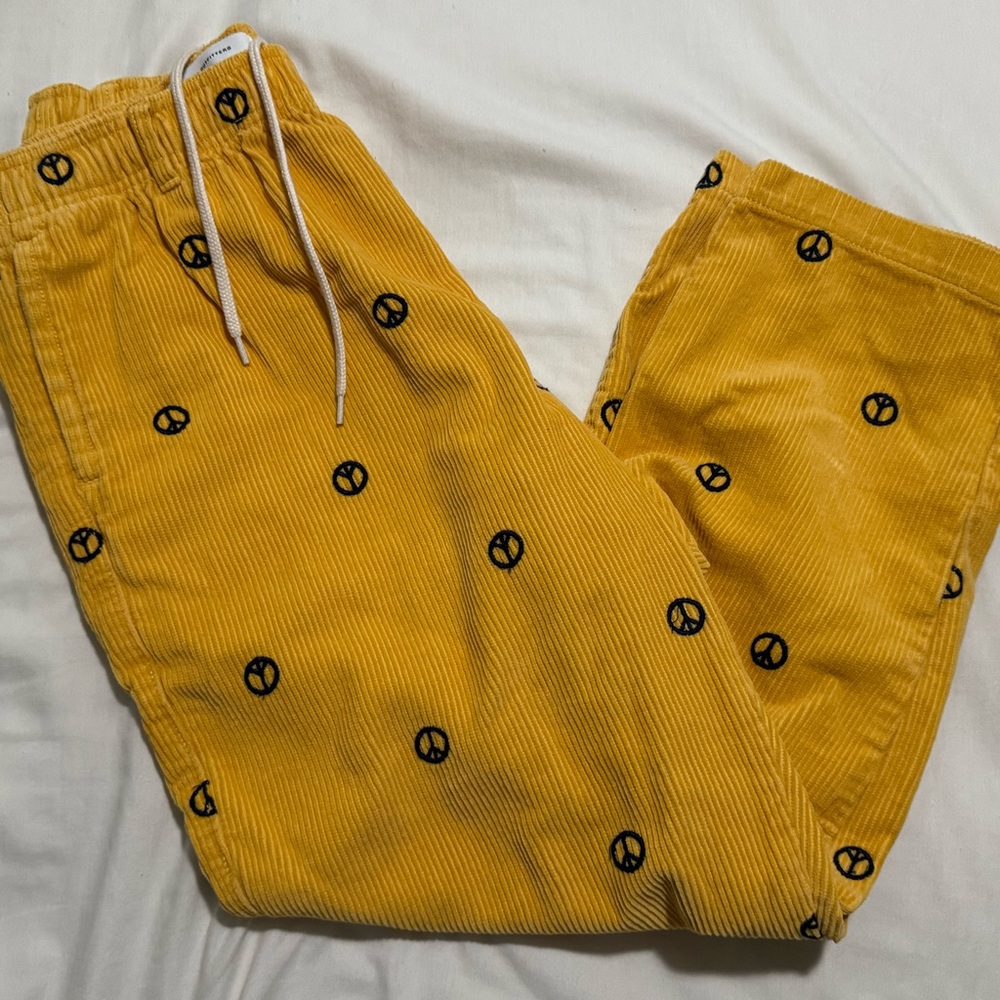Urban Outfitters Yellow Corduroy Pants with Peace Symbols